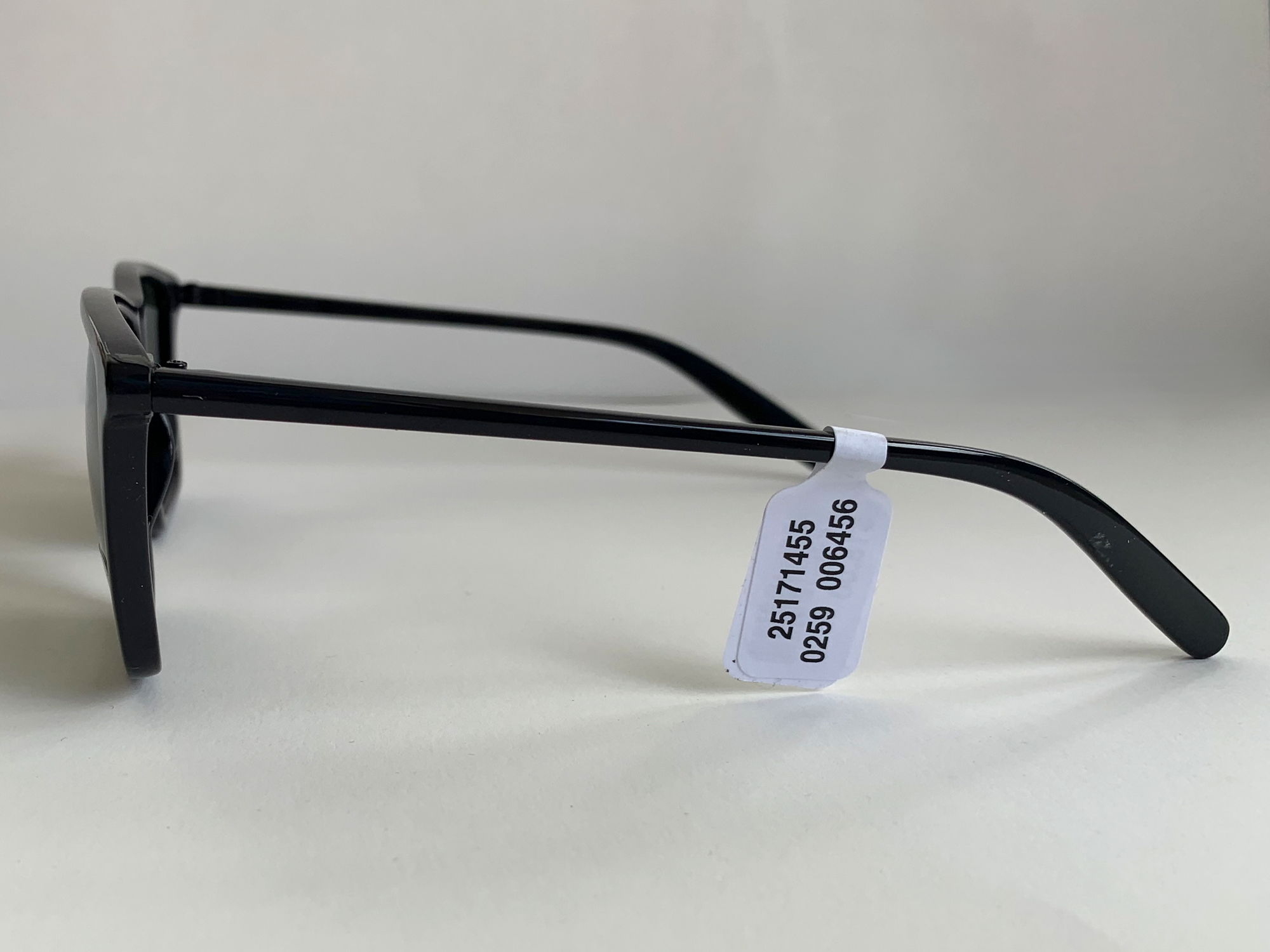 Urban Outfitters | Thin Black sunglasses side view - moorganstern